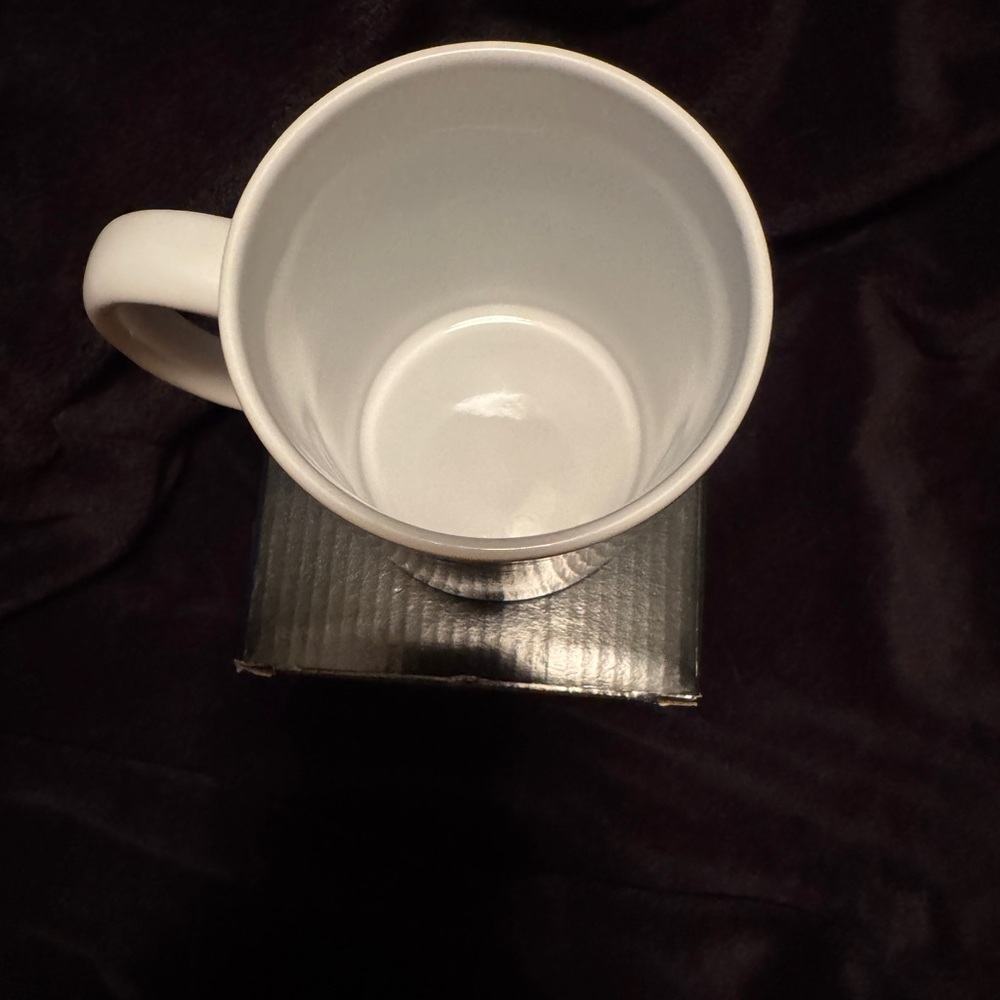Coach Ceramic Mug with Brown Signature Pattern & Mint Band

(Fashion) - Picture 4 of 4